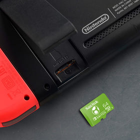 SanDisk card inserted in a Nintendo Switch slot for quick installs