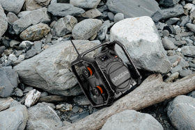 Sangean U7HD built-in smart battery charger indicator during on-site power management.