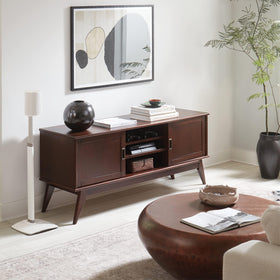 Sanus Era 100 stand includes carpet spikes for secure grip on soft surfaces