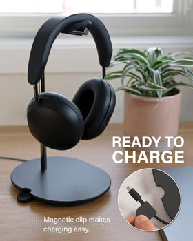Sanus scale comparison beside laptop to show compact footprint