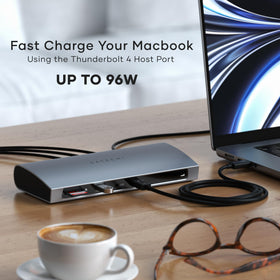 Satechi Thunderbolt 4 Dock in use with a MacBook for charging and displays.