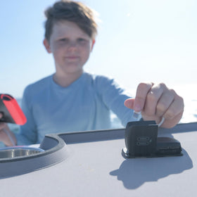 On-dashboard installation of Scanstrut SC-Multi-F1 Flip Pro Multi aboard a boat or vehicle.