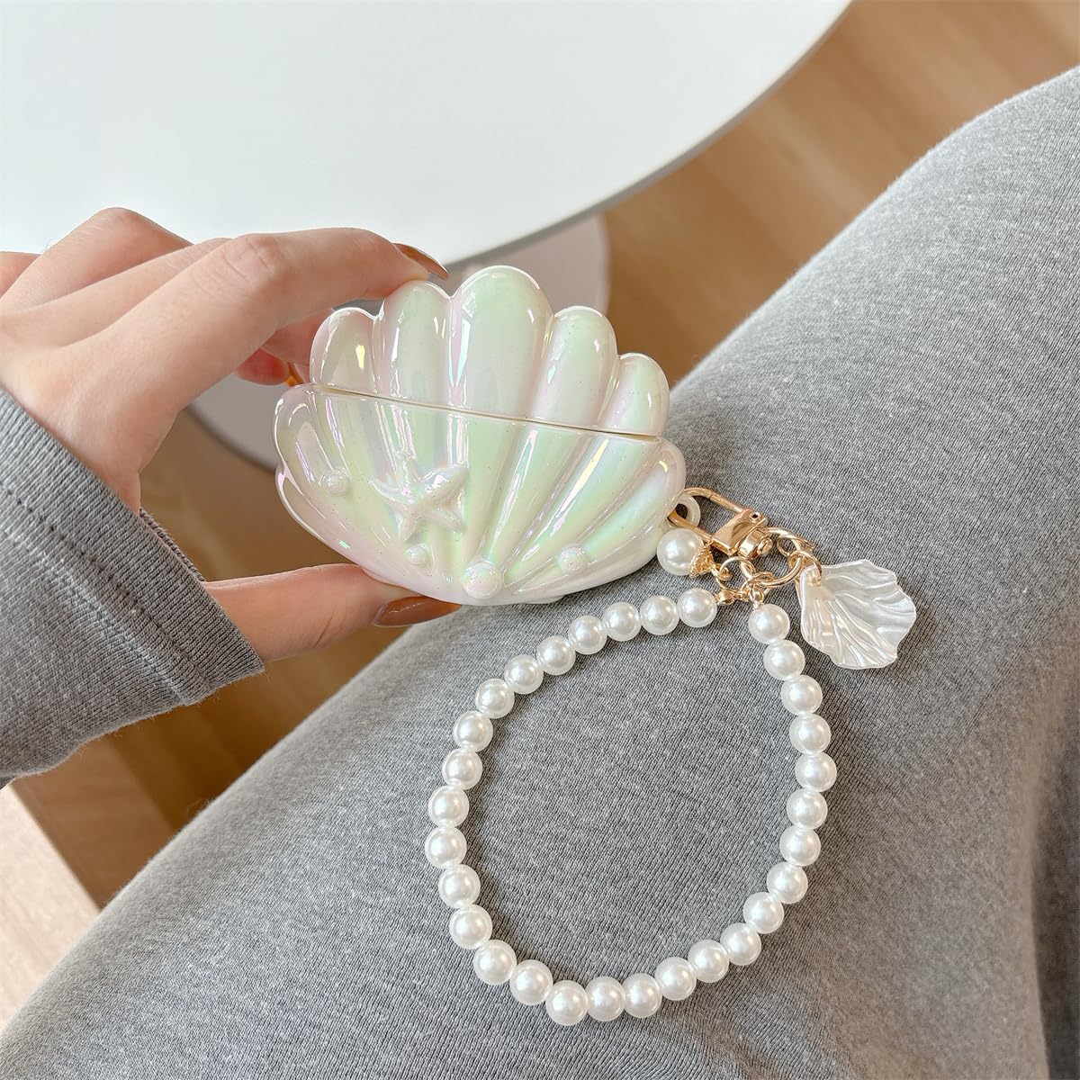 SCQYCWA seashell pendant-design AirPods Pro 3 case for easy carrying.