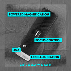 SE pocket microscope next to ruler showing scale and travel-friendly benefit