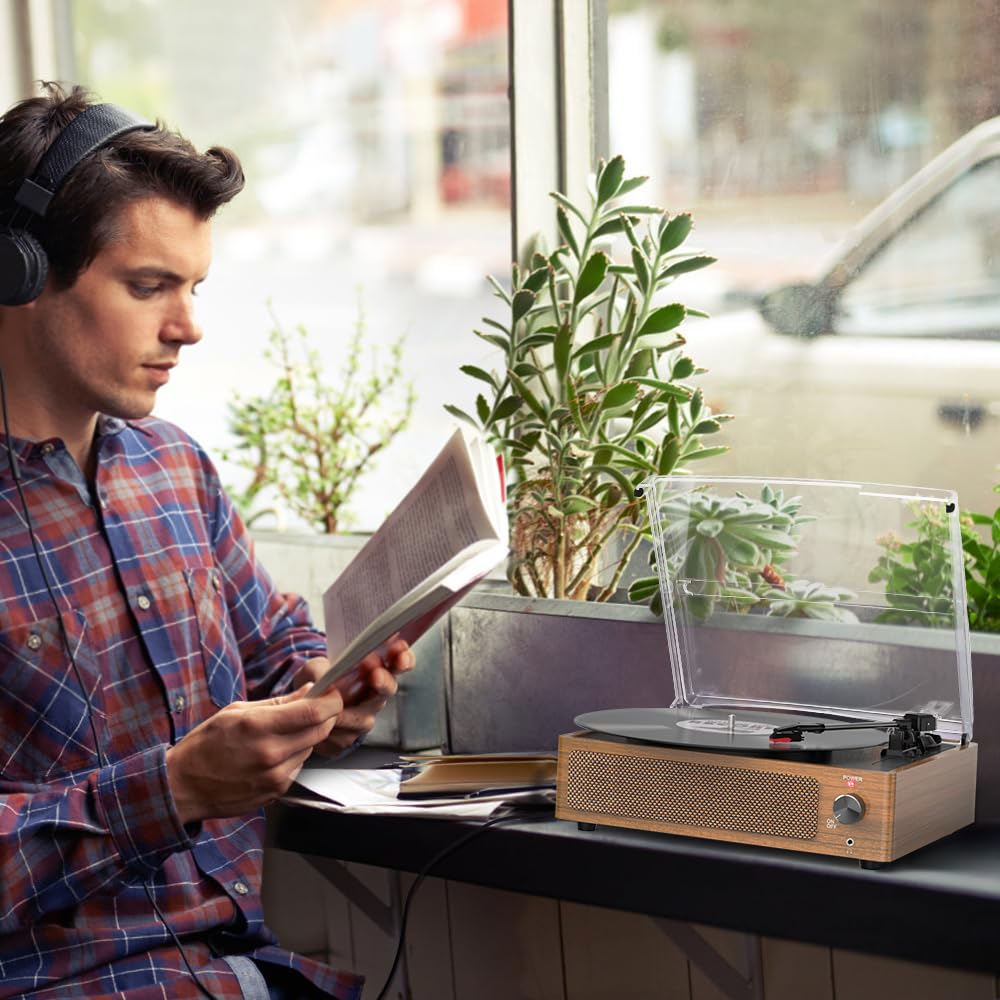 seasonlife beside record and headphones for scale and portable listening benefit