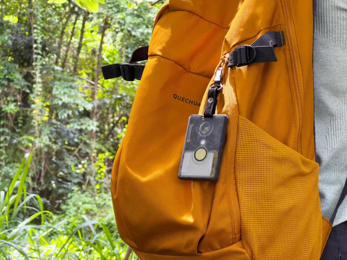 Seeed Studio T1000-E mounted on outdoor gear demonstrating rugged tracking integration