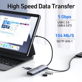 Selore&S-Global shown next to a laptop and USB-C cable to show scale and portability benefit