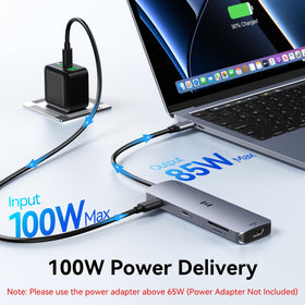 Selore&S-Global next to MacBook to show compact size and portability