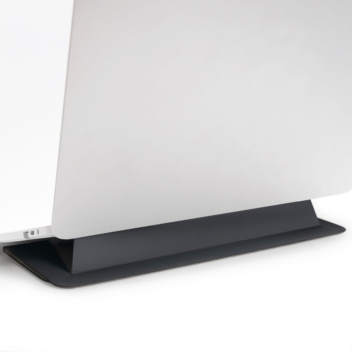 SenseAGE front view showing charcoal stand and stable laptop support benefit