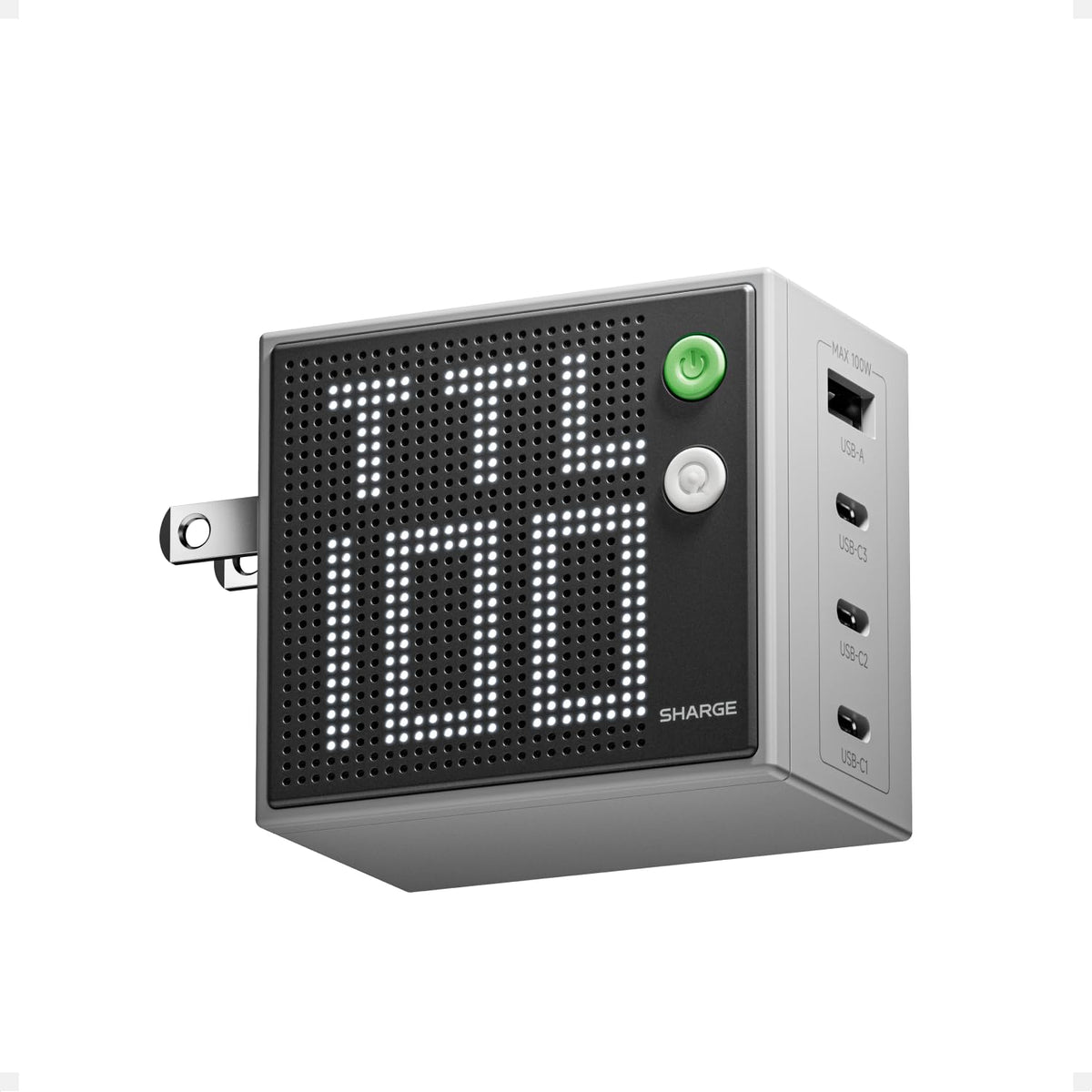 SHARGE Pixel 100 charger on desk with four ports for versatile fast charging.