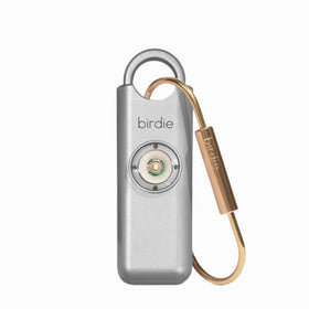 She’s Birdie front view metallic silver showing compact form and easy-carry benefit