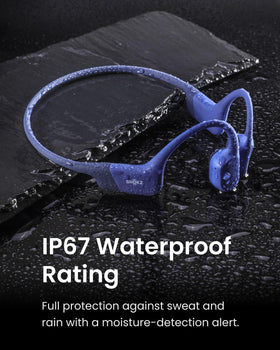 SHOKZ OpenRun Mini at gym with IP67 waterproof rating for sweat durability.