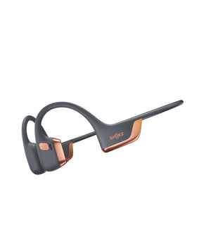 SHOKZ OpenRun Pro rose gold hero demonstrates open-ear design for workouts.