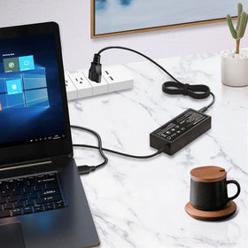 SiKER charger on a desk powering a laptop and phone for a tidy multifunction workspace