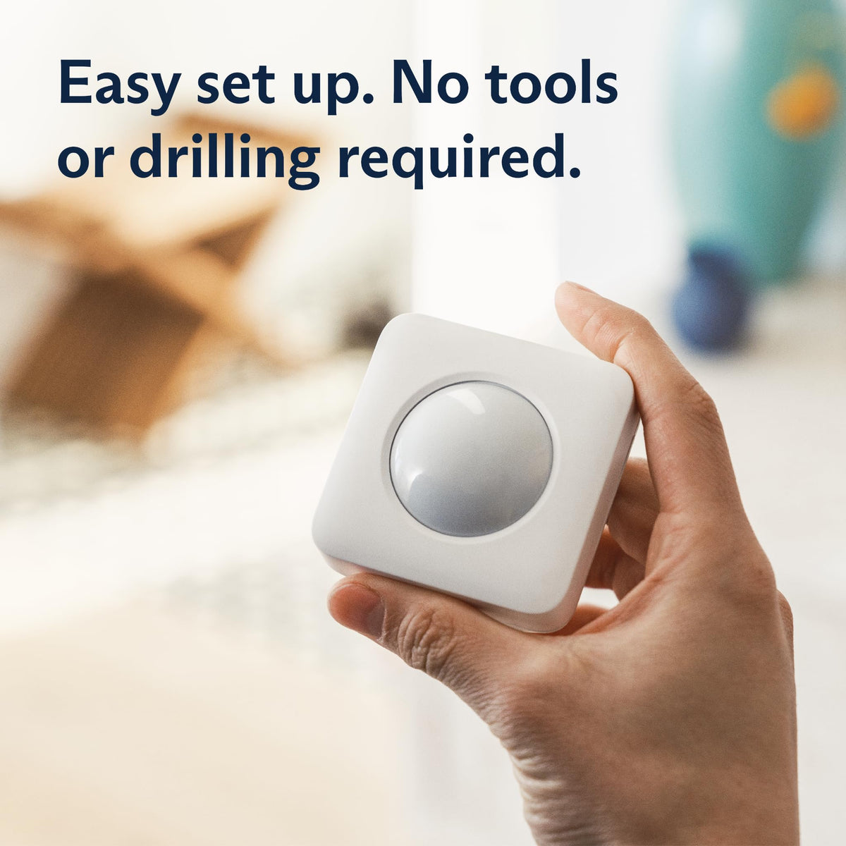 SimpliSafe motion sensor mounted in a room corner for wide coverage and fewer blind spots