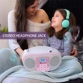 SINGING WOOD boombox with foldable handle being carried to show portability