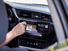 SiriusXM vehicle dock with PowerConnect for secure car installation.