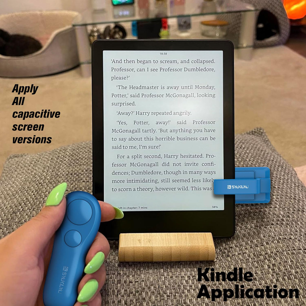 SK SYUKUYU remote in hand demonstrating one-button page-turn comfort