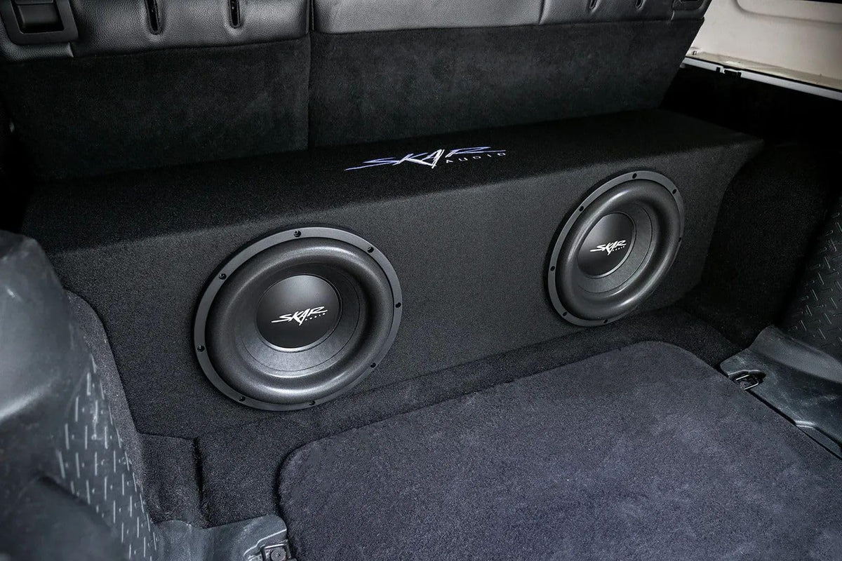 Skar Audio dual 12s visible inside enclosure for strong bass potential