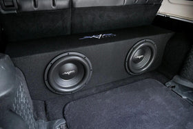 Skar Audio dual 12s visible inside enclosure for strong bass potential