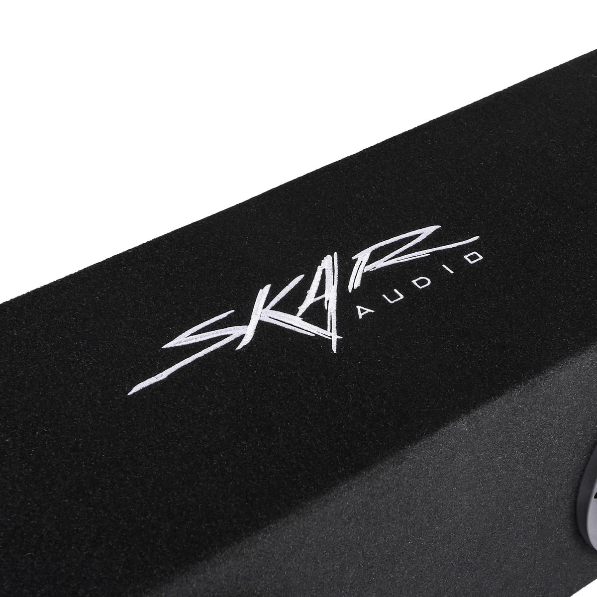 Skar Audio wiring cup closeup highlighting 1-ohm impedance ready hookup