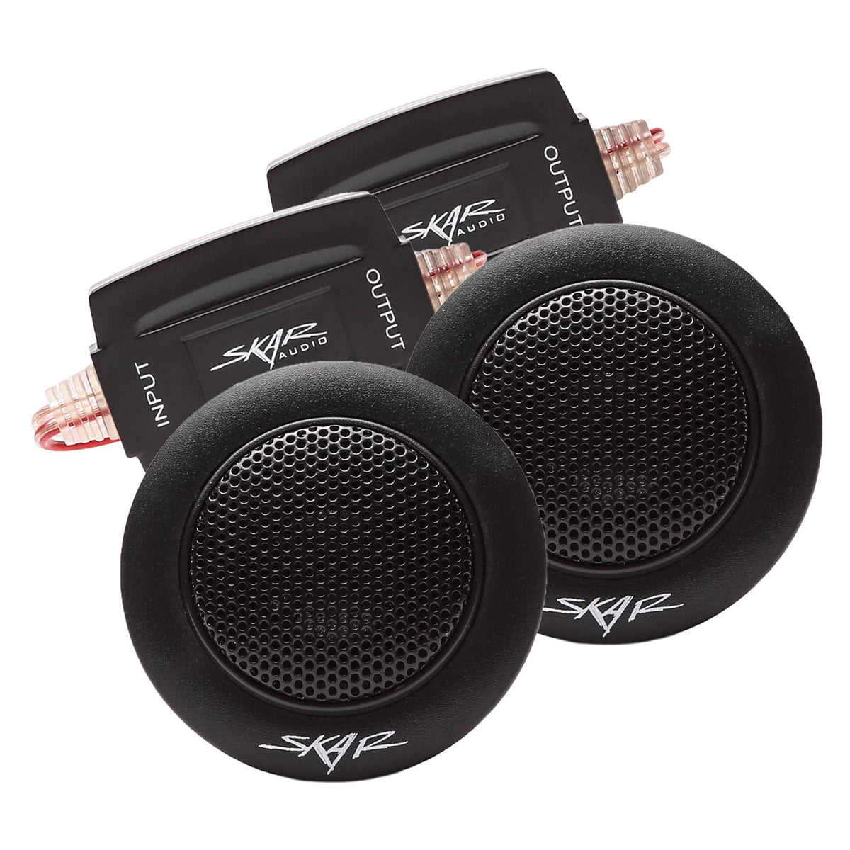 Skar Audio TX-T next to a coin for scale, compact fit for factory locations and custom pods