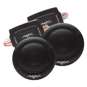 Skar Audio TX-T next to a coin for scale, compact fit for factory locations and custom pods