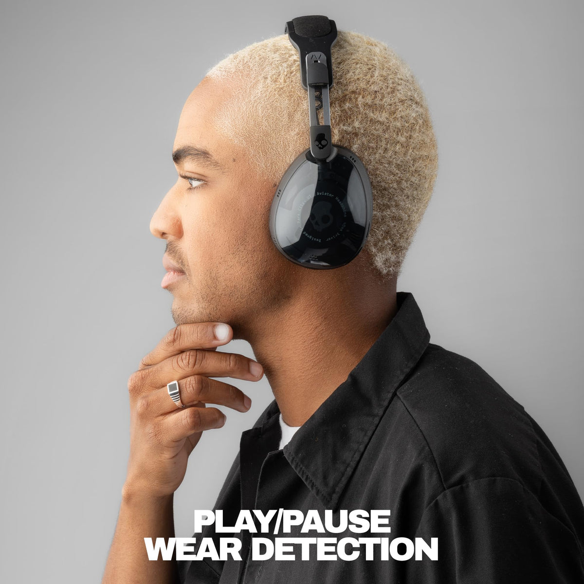 Aviator 900 ANC wear detection auto-pauses playback when removed.