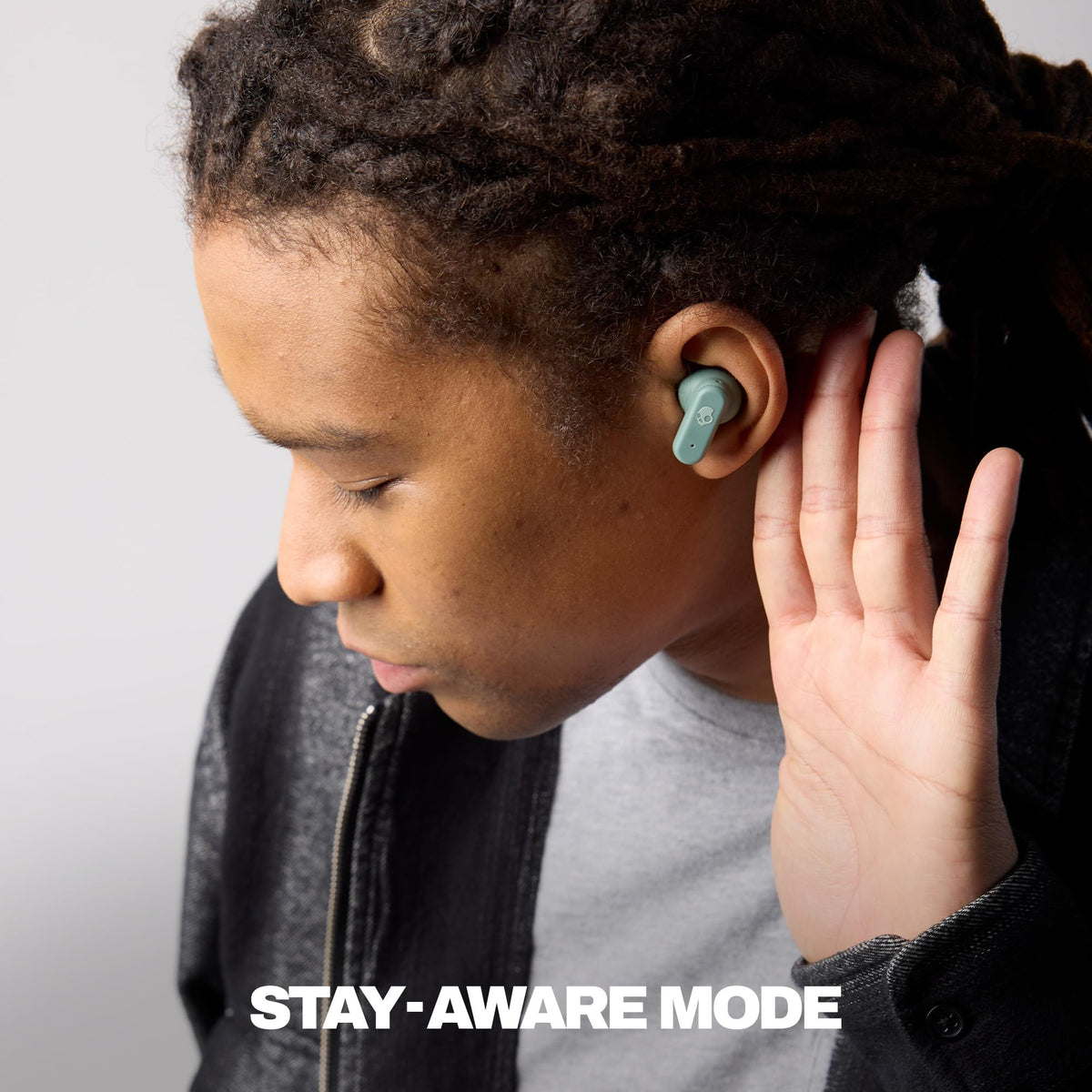 Skullcandy Dime Evo earbuds close-up highlighting texture and fit, improves clarity