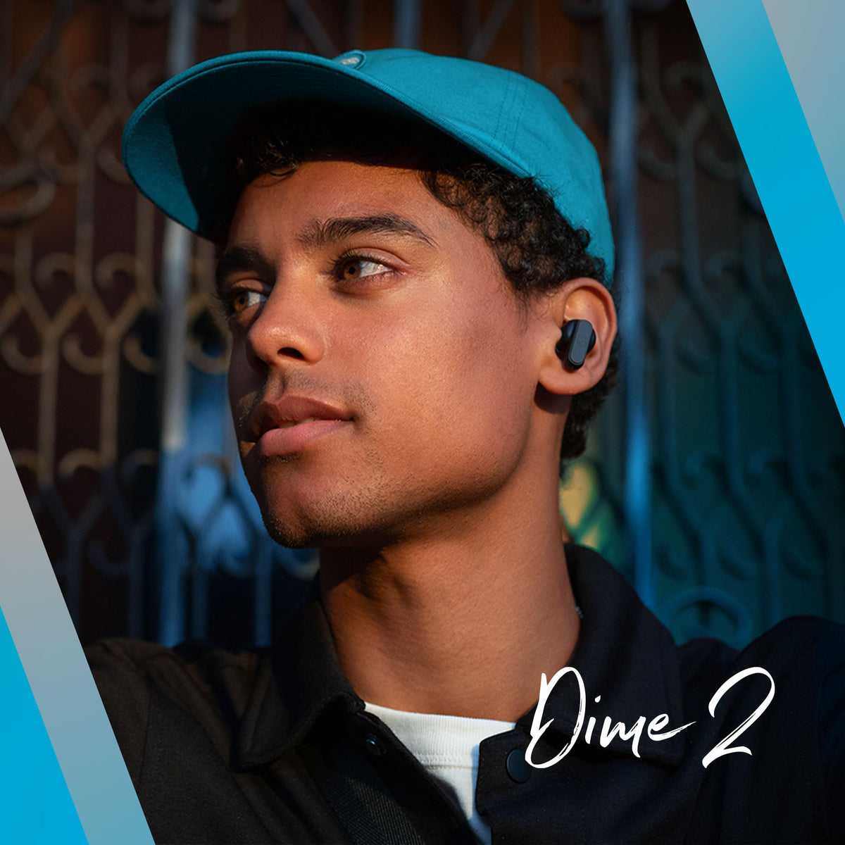 Skullcandy Dime 2 beside smartphone to show pocket-friendly scale
