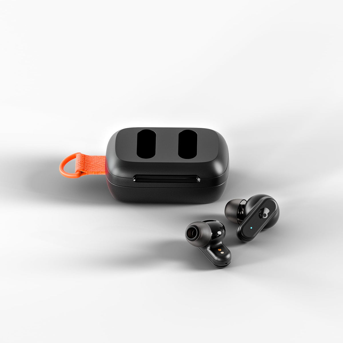 Skullcandy Dime 3 integrated lanyard clipped to bag for hands-free carry