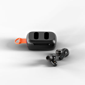 Skullcandy Dime 3 integrated lanyard clipped to bag for hands-free carry