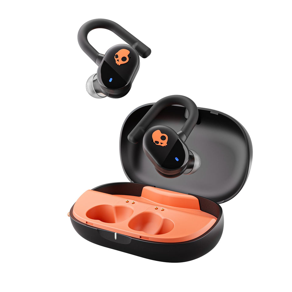 Skullcandy Push Play Active earbuds in hand show compact design for workouts