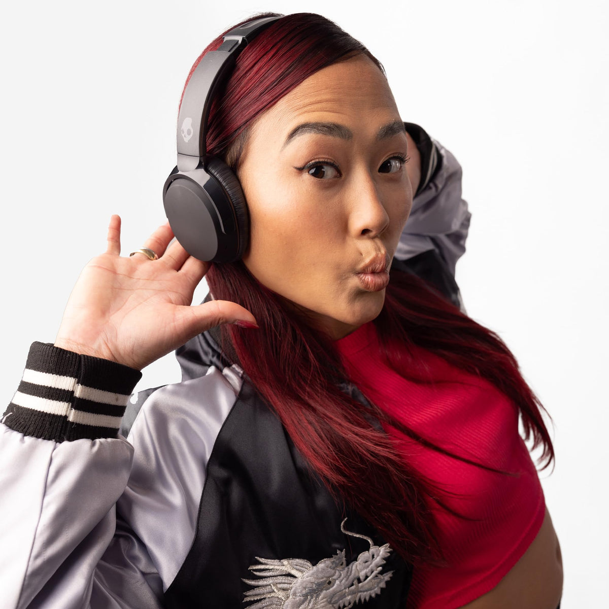 Skullcandy Riff Wireless 2 worn outdoors demonstrating travel-ready convenience