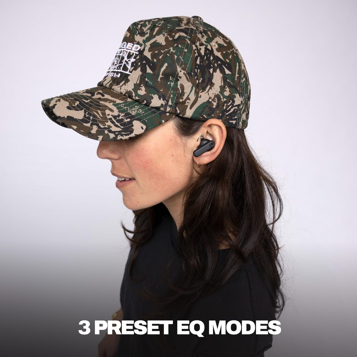 Skullcandy Smokin’ Buds open charging case showing earbuds and battery
