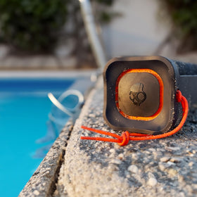 Skullcandy Terrain nylon wrist wrap and clip for secure carrying on the move