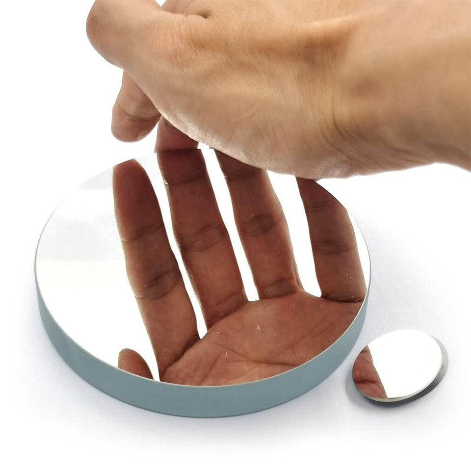 Skyoptikst front face of 114mm mirror showing smooth optical surface and precise finish for sharper views