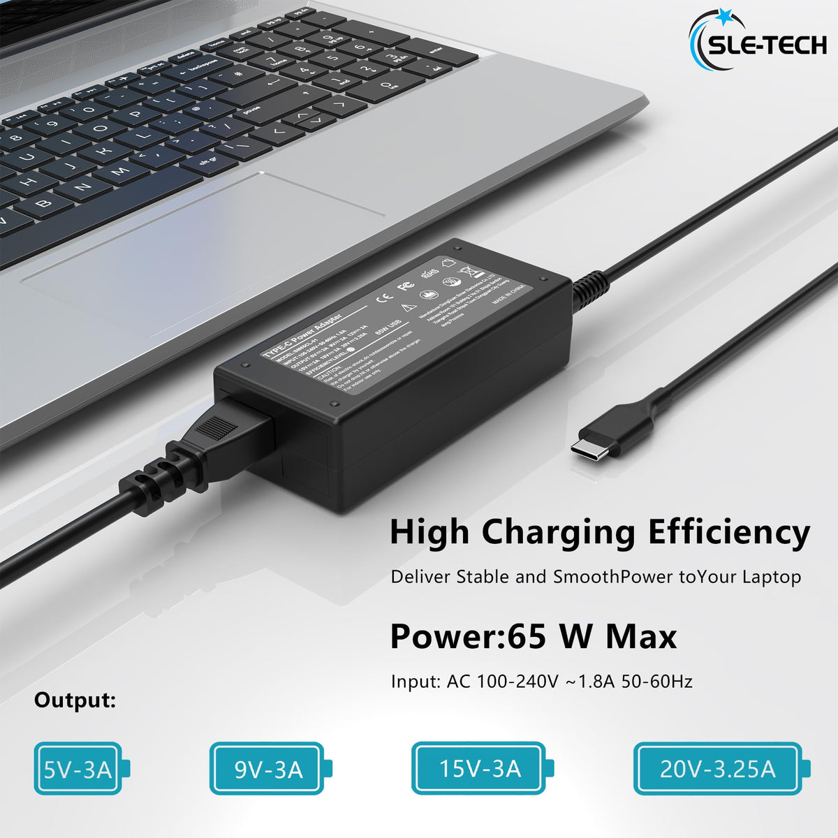 SLE-TECH 65W USB-C charger in-use on a desk with a laptop.