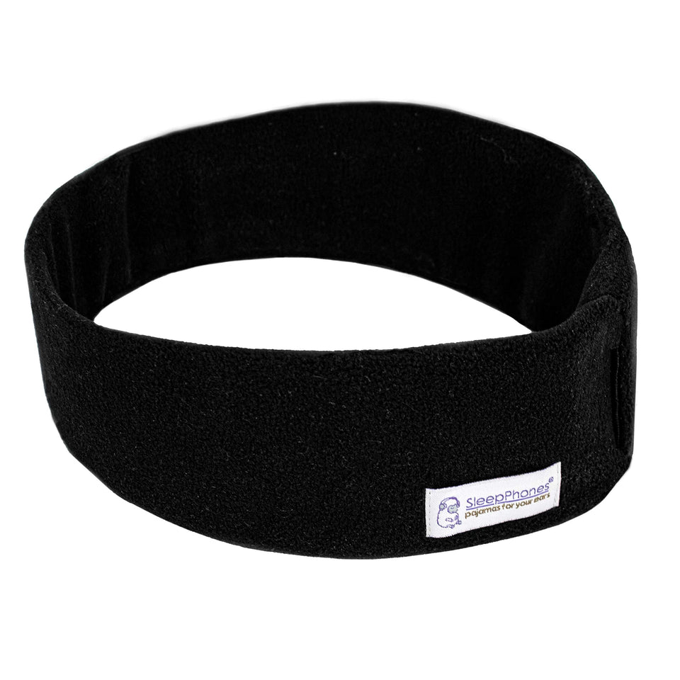 SleepPhones wireless sleep headphones in midnight black fleece worn for night listening comfort