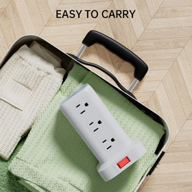 SMALLRT tower next to smartphone and laptop illustrating multi-device charging