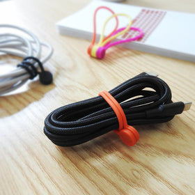 Smart&Cool silicone magnetic ties provide quick, flexible closure for cords near chargers.