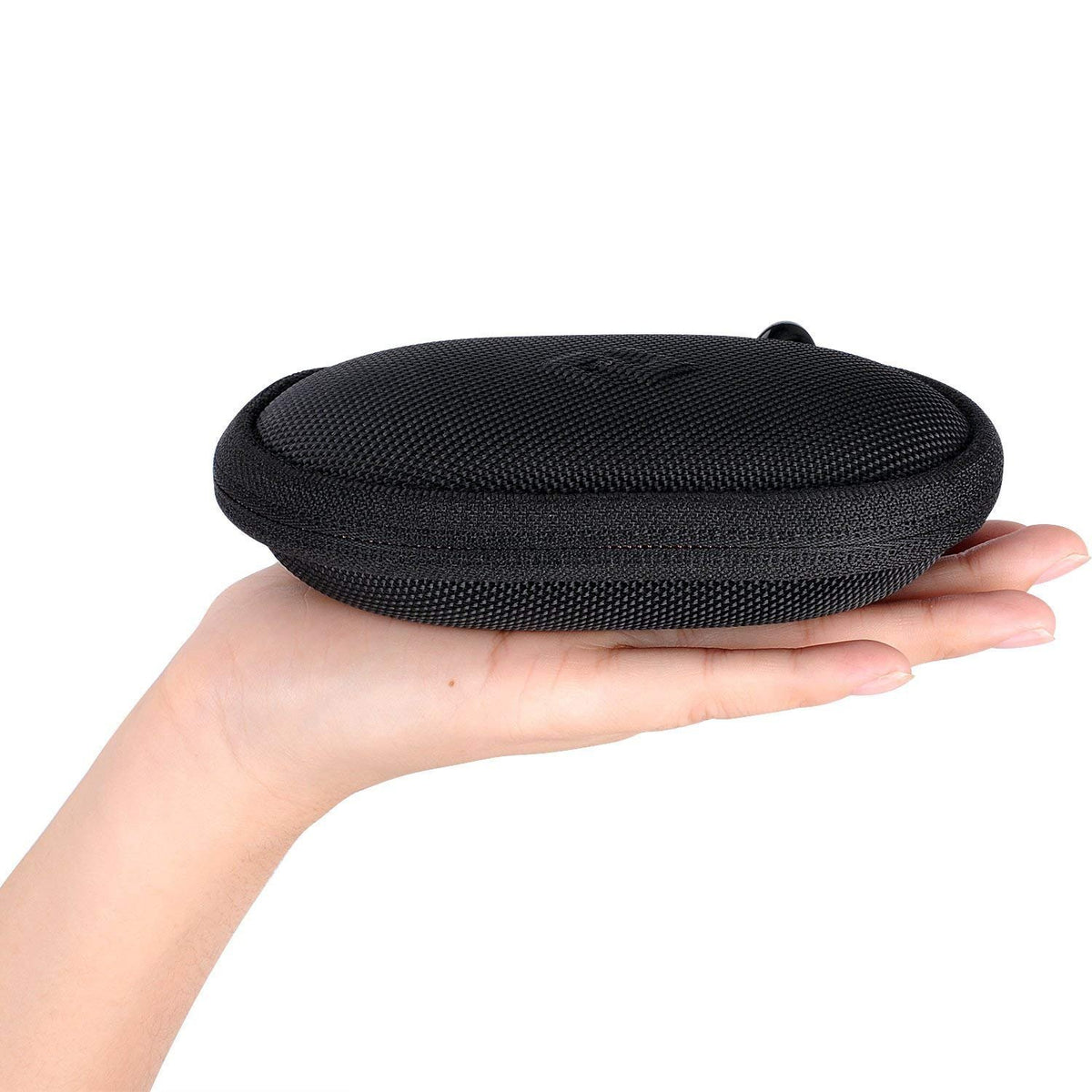 Smatree next to smartphone illustrating compact size and travel-friendly fit