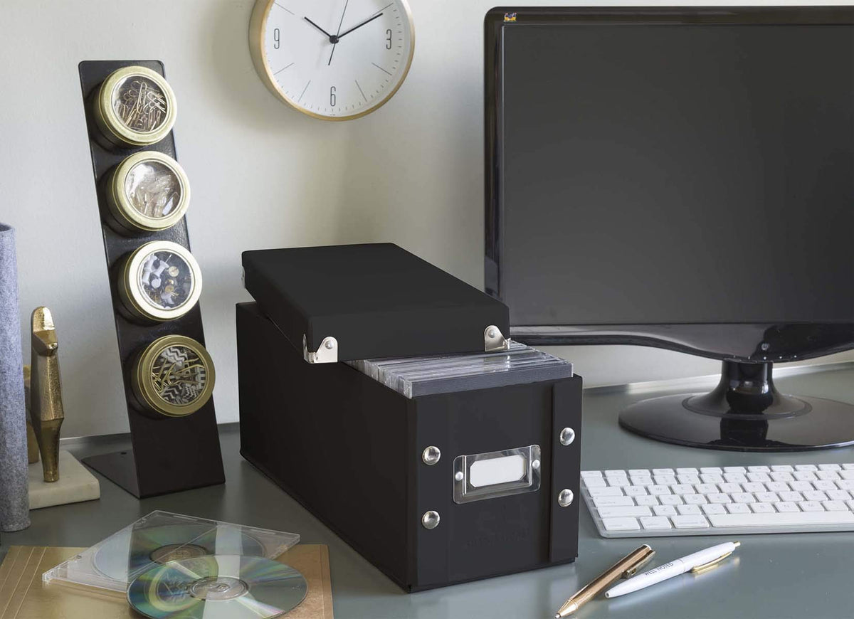 Snap-N-Store CD storage box with open lid for quick access to discs.