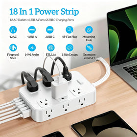 Solidock flat plug close-up angled to slip behind furniture for space saving