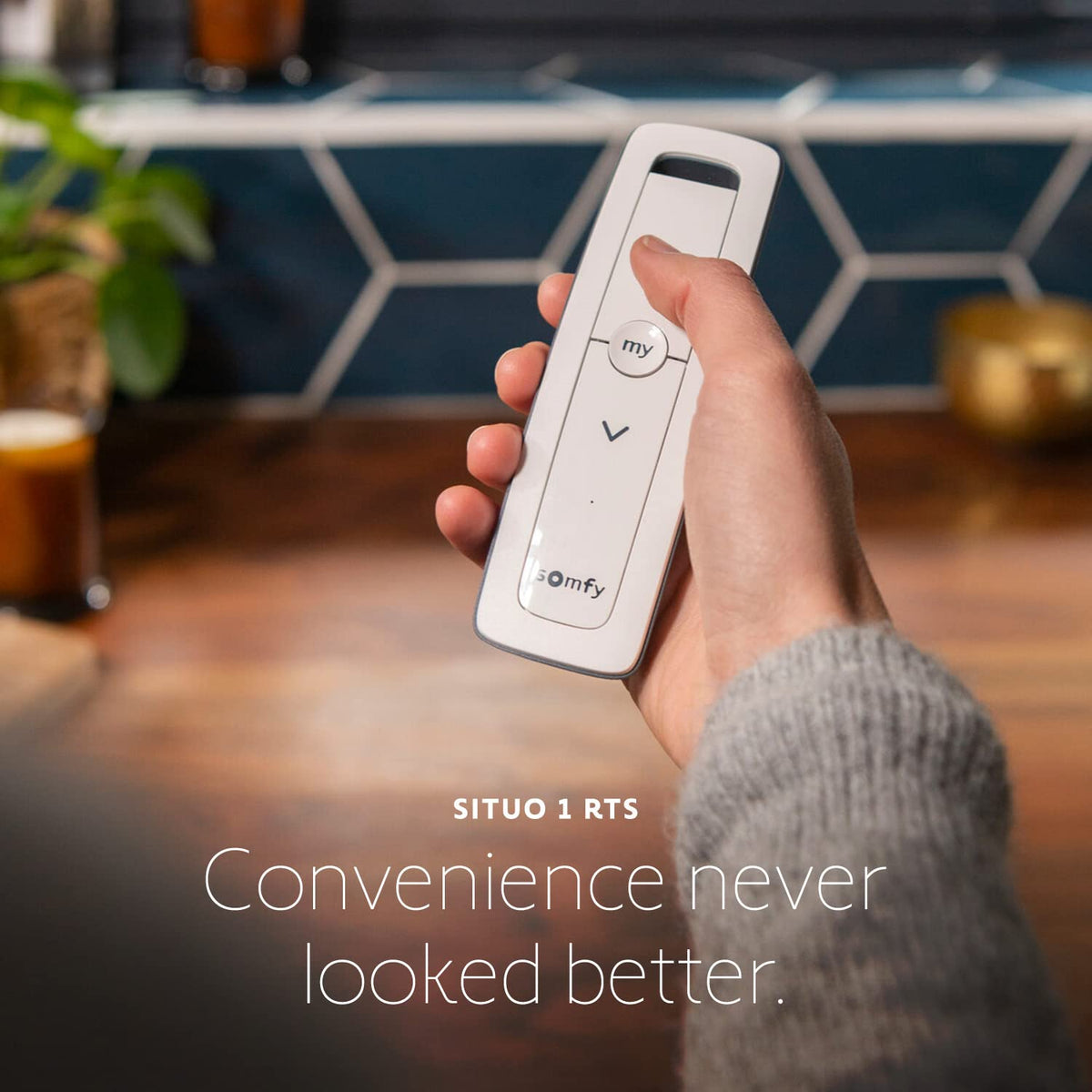 Slim side view of Somfy Situo 1 Pure remote for discreet bedside use.
