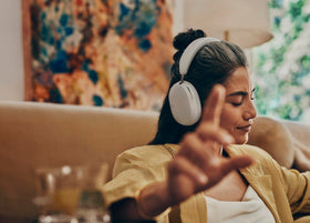 Sonos Ace headphones side view highlighting sleek design and comfort.