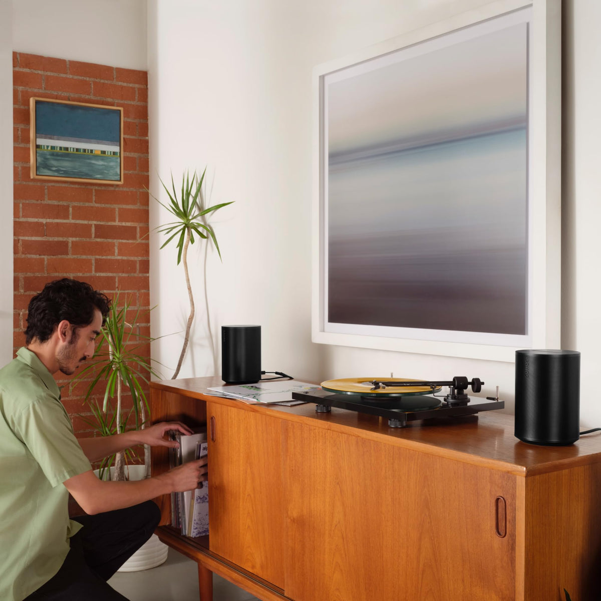 Sonos Era 100 angled view suggesting deep bass and clarity