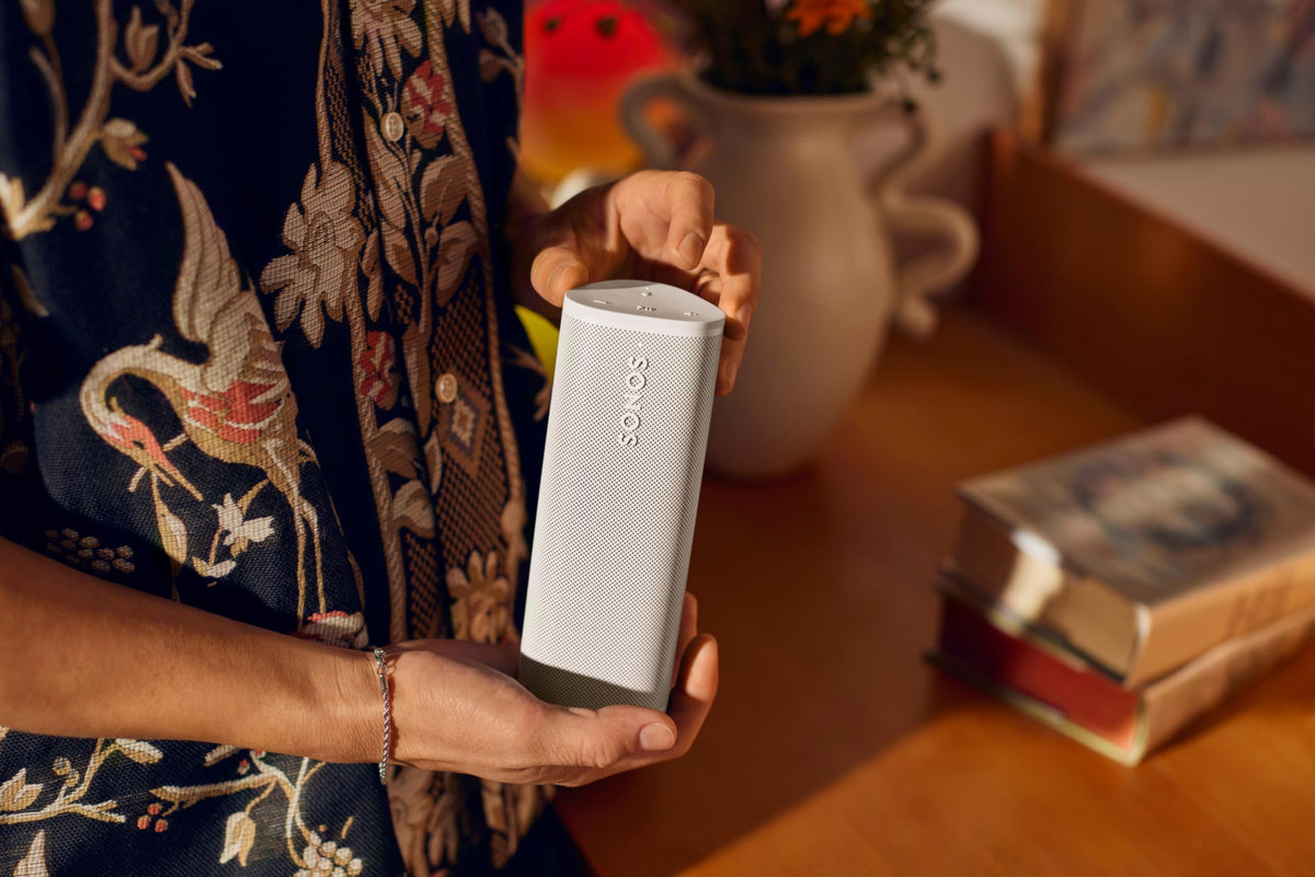 Roam 2 white in a home setup illustrating multiroom compatibility