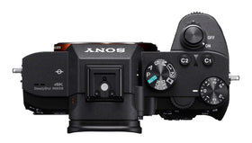 Sony a7 III with 28-70mm lens carried in a travel bag.