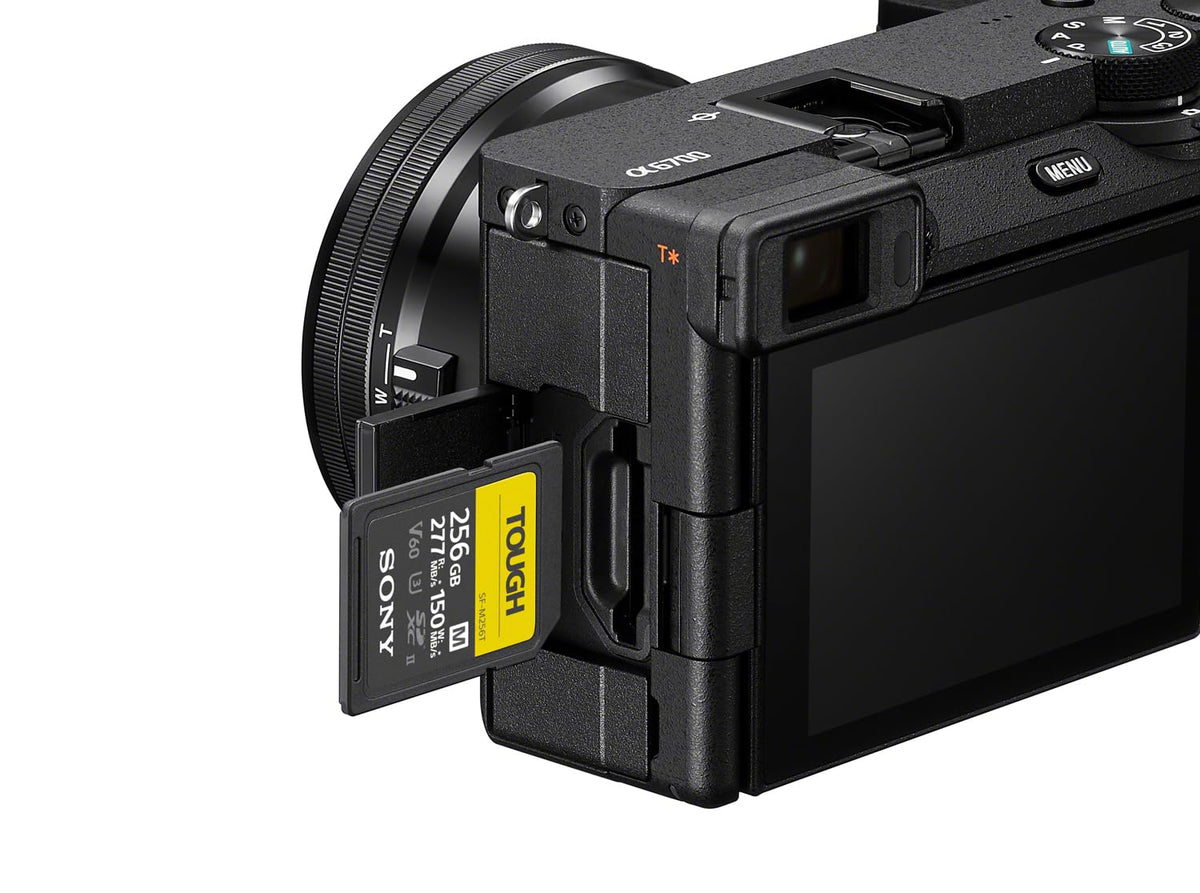 Sony Alpha 6700 beside a compact travel case for easy packing.